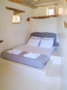 Postel nebo postele na pokoji v ubytování Gaia Vacation Home