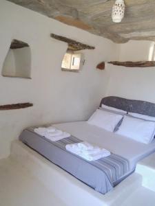 Postel nebo postele na pokoji v ubytování Gaia Vacation Home