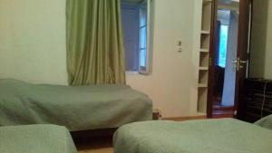 Letto o letti in una camera di Guesthaus King Seti