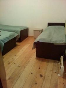 Letto o letti in una camera di Guesthaus King Seti