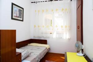 Posteľ alebo postele v izbe v ubytovaní Seaside Apartment Tisno