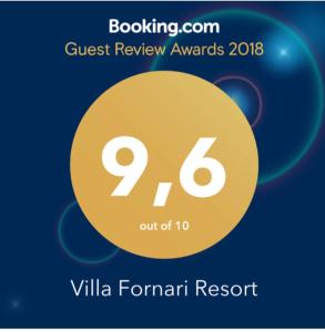 ビシェーリエにあるVilla Fornari Resortの黄色の円で客評を読む看板