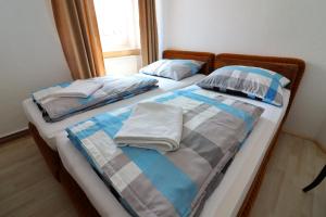Postel nebo postele na pokoji v ubytování Guesthouse Veles
