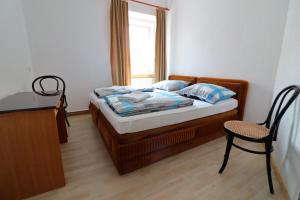 Postel nebo postele na pokoji v ubytování Guesthouse Veles