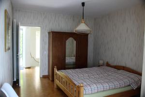 מיטה או מיטות בחדר ב-Casa Creavita