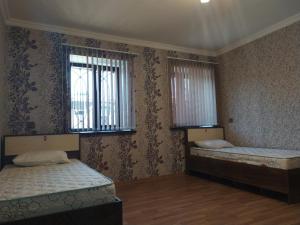 Postel nebo postele na pokoji v ubytování VM Hostel