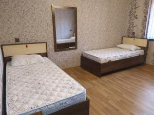 Postel nebo postele na pokoji v ubytování VM Hostel
