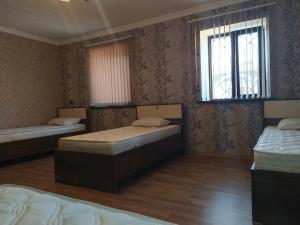 Postel nebo postele na pokoji v ubytování VM Hostel