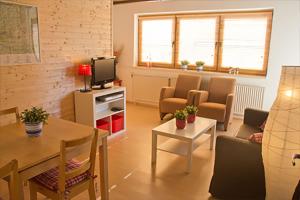 A television and/or entertainment centre at Haus Taekema Appartments