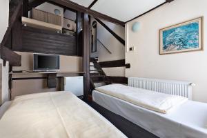 Postel nebo postele na pokoji v ubytování Penzion Hotel Morrison