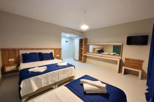 Postel nebo postele na pokoji v ubytování Lidya Hotel
