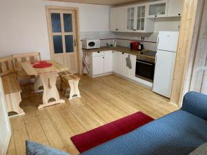 Kuchyň nebo kuchyňský kout v ubytování Apartmány Michaela