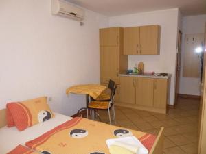 Kuchyň nebo kuchyňský kout v ubytování Apartments Villa Rosmarin