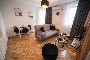 Area soggiorno di Royal Apartment