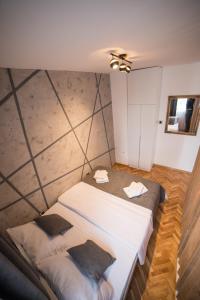 Letto o letti in una camera di Royal Apartment