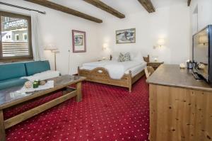 Postel nebo postele na pokoji v ubytování DEP GÄSTEHAUS Residenz + 6 fotografií