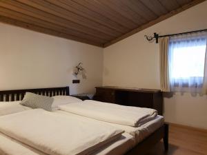 Postel nebo postele na pokoji v ubytování DEP GÄSTEHAUS Residenz