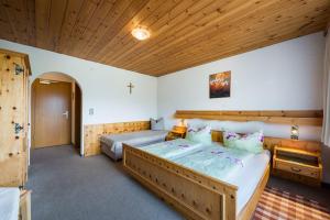 Letto o letti in una camera di Ferienpension Steiner