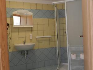 Koupelna v ubytování Rooms Pri Lovrižu + 37 fotografií