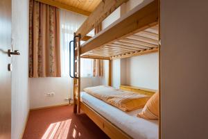 Letto o letti in una camera di Ferienpension Steiner