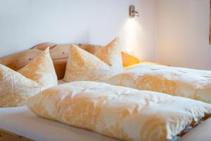 Letto o letti in una camera di Ferienpension Steiner