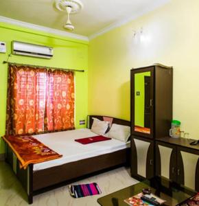 Ένα ή περισσότερα κρεβάτια σε δωμάτιο στο Sunview Resort