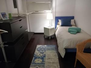 Tempat tidur dalam kamar di Bastioni Home