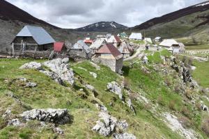 a group of houses on top of a hill at Etno-house Lukomir in Lukomir +38 photos