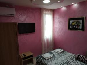 Ліжко або ліжка в номері Apartmani Spasic