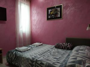 Ліжко або ліжка в номері Apartmani Spasic