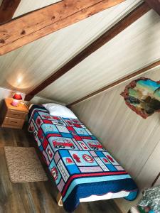 a bedroom with a bed in a attic at Riia 141 Apartment in Pärnu