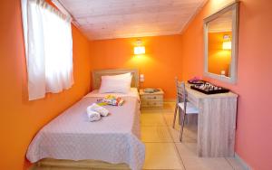 Letto o letti in una camera di Lazy Lizard