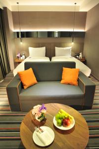 Ένα ή περισσότερα κρεβάτια σε δωμάτιο στο WESTGATE Hotel