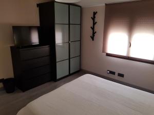 Postel nebo postele na pokoji v ubytování Casa Carol