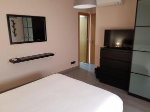 Postel nebo postele na pokoji v ubytování Casa Carol