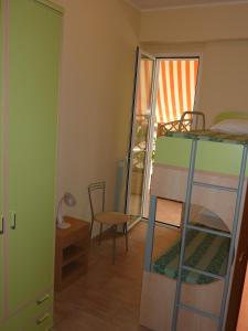 A bed or beds in a room at Beaurivage