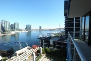 a view of a body of water from a building at ACD Apartments in Melbourne