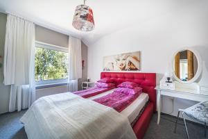 Postel nebo postele na pokoji v ubytování Willa Onyks Apartamenty