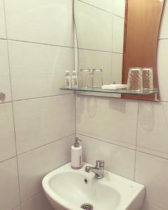 Ένα μπάνιο στο Apartments Glitter