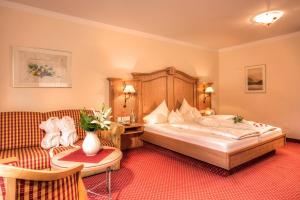 Postel nebo postele na pokoji v ubytování Hotel Gletscherblick