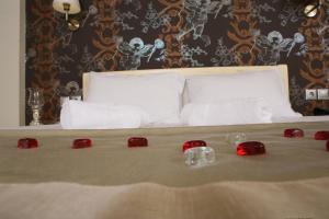Voodi või voodid majutusasutuse Michaelangelo Boutique Parga toas