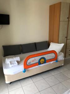 Postel nebo postele na pokoji v ubytování Iason Apartments