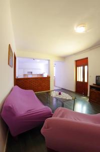 a room with two beds and a table at Large and charming apartment near beach with big & sunny terrace in Sumartin