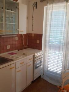 Kuchyň nebo kuchyňský kout v ubytování House Kaić + 37 fotografií