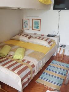 Postel nebo postele na pokoji v ubytování House Kaić