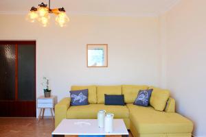 A seating area at T8 APARTMENT ON THE BEACH