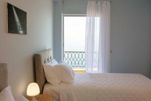 A bed or beds in a room at T8 APARTMENT ON THE BEACH