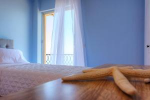 A bed or beds in a room at T8 APARTMENT ON THE BEACH