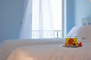 A bed or beds in a room at T8 APARTMENT ON THE BEACH