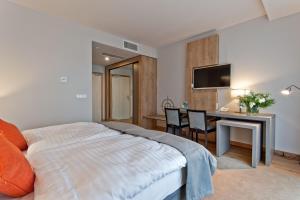 Posteľ alebo postele v izbe v ubytovaní Hotel Forza